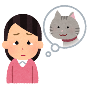 迷子になった猫を心配する女性